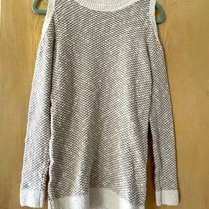 Long sweater with shoulder cut outs